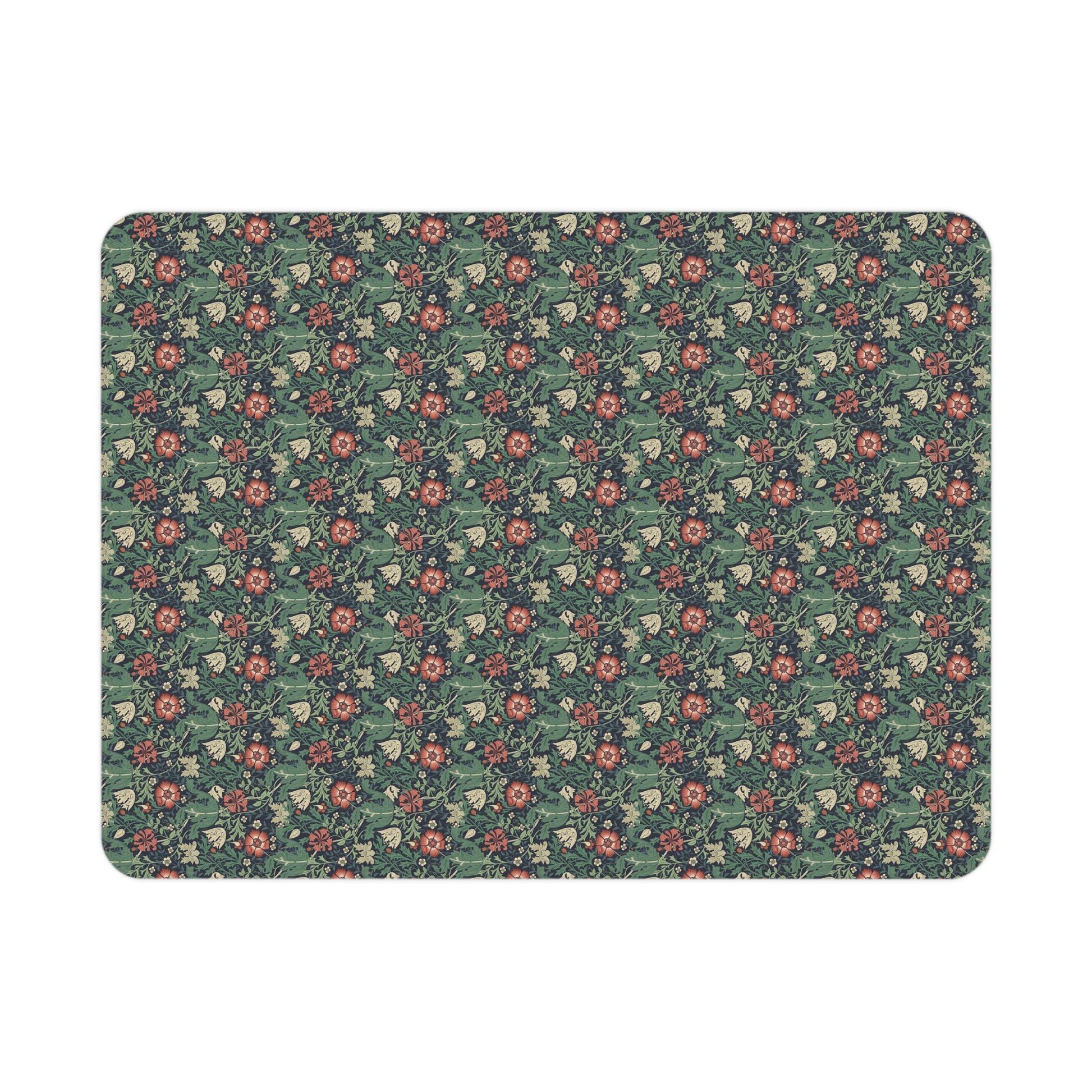 Floral patterned mat with small flowers on a green background