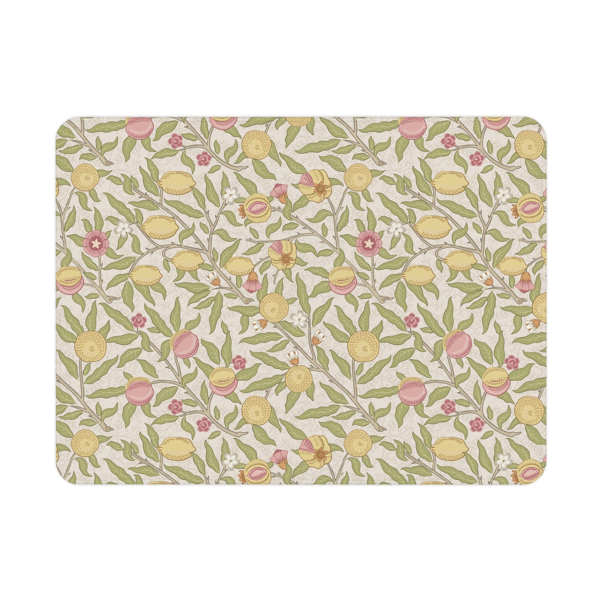 Floral patterned mat with lemons and leaves on a beige background