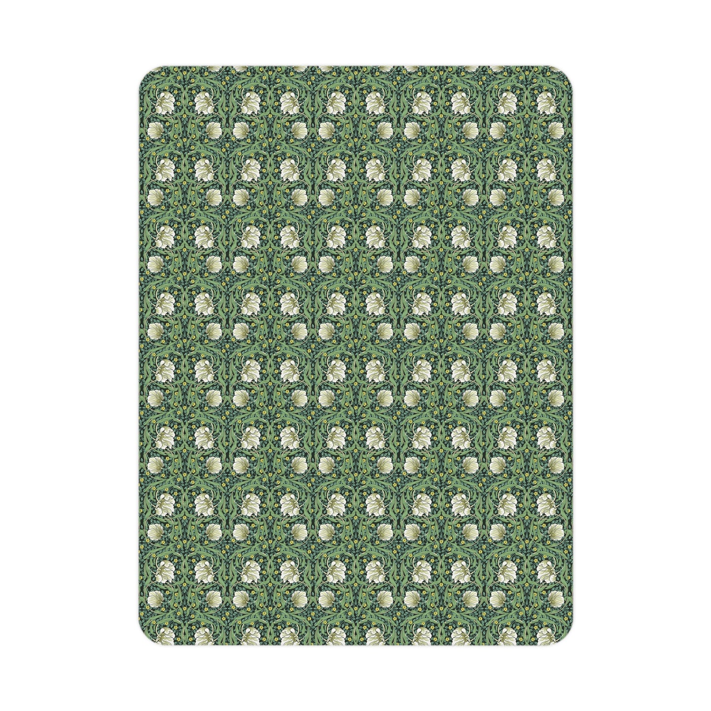 Green floral William Morris & Co Pimpernel patterned toddler blanket draped over a crib