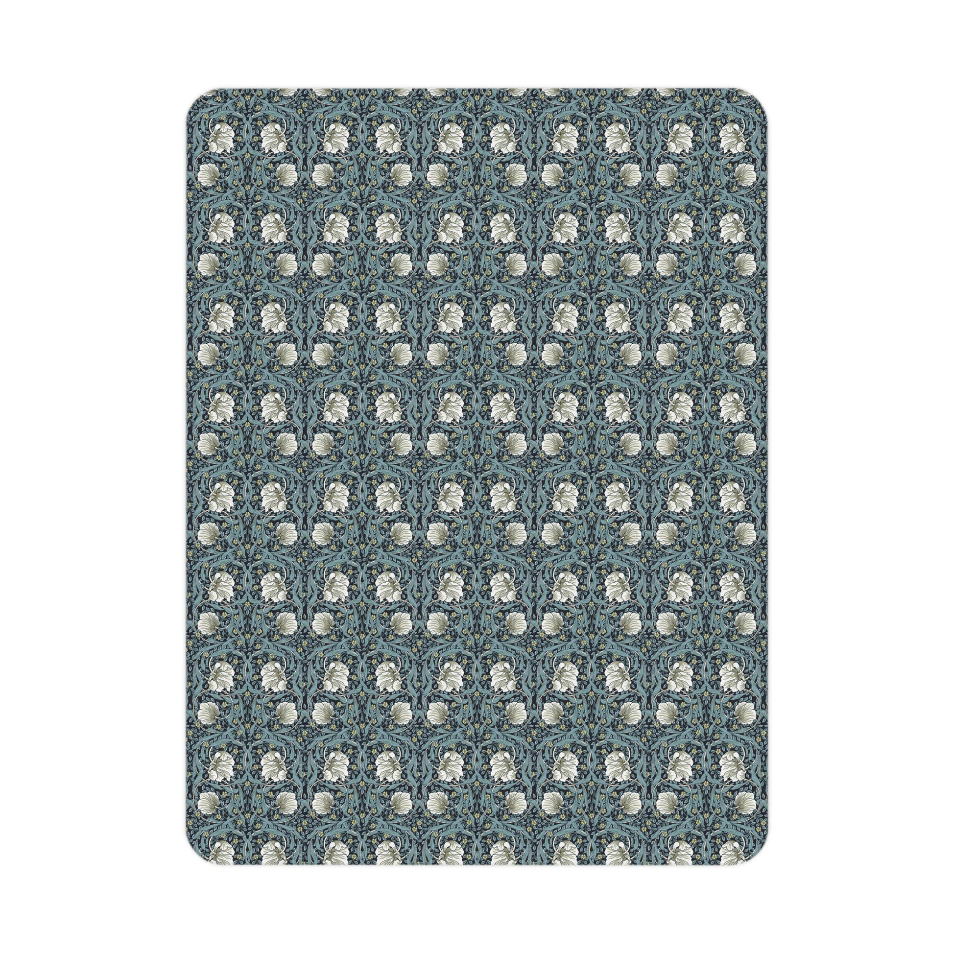 Patterned blanket rug with blue and white design on a white background