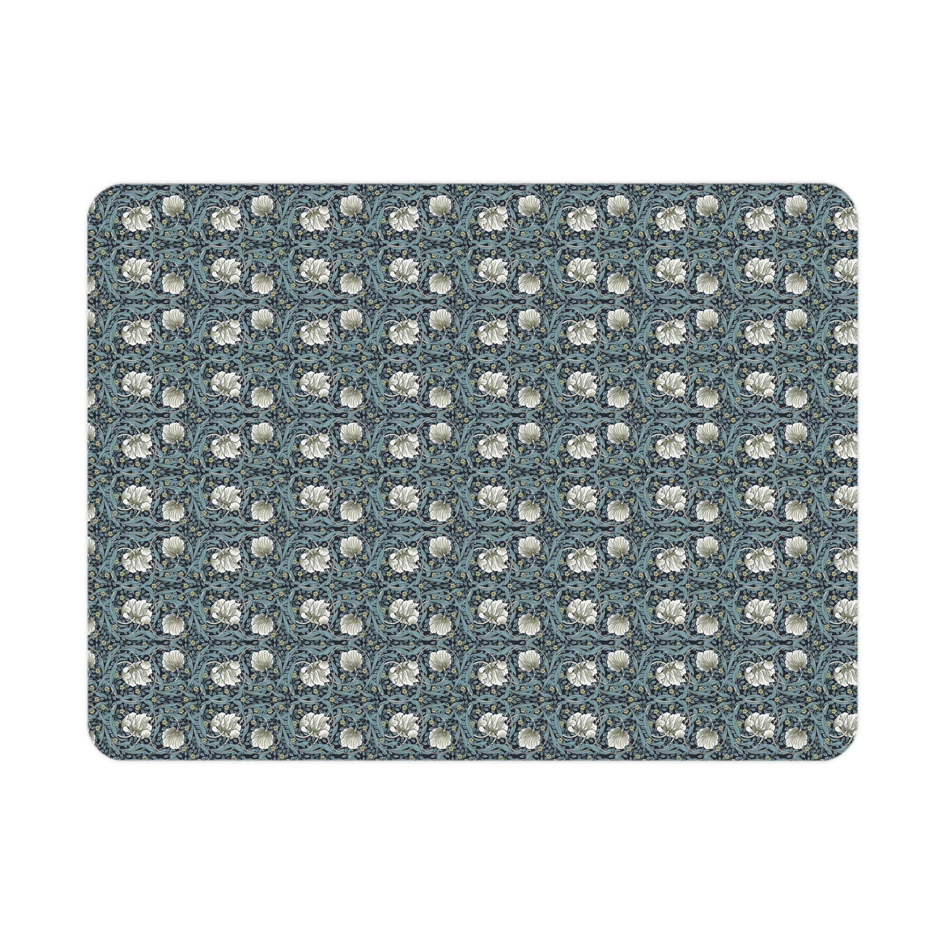 Patterned blanket with white floral design on a blue background