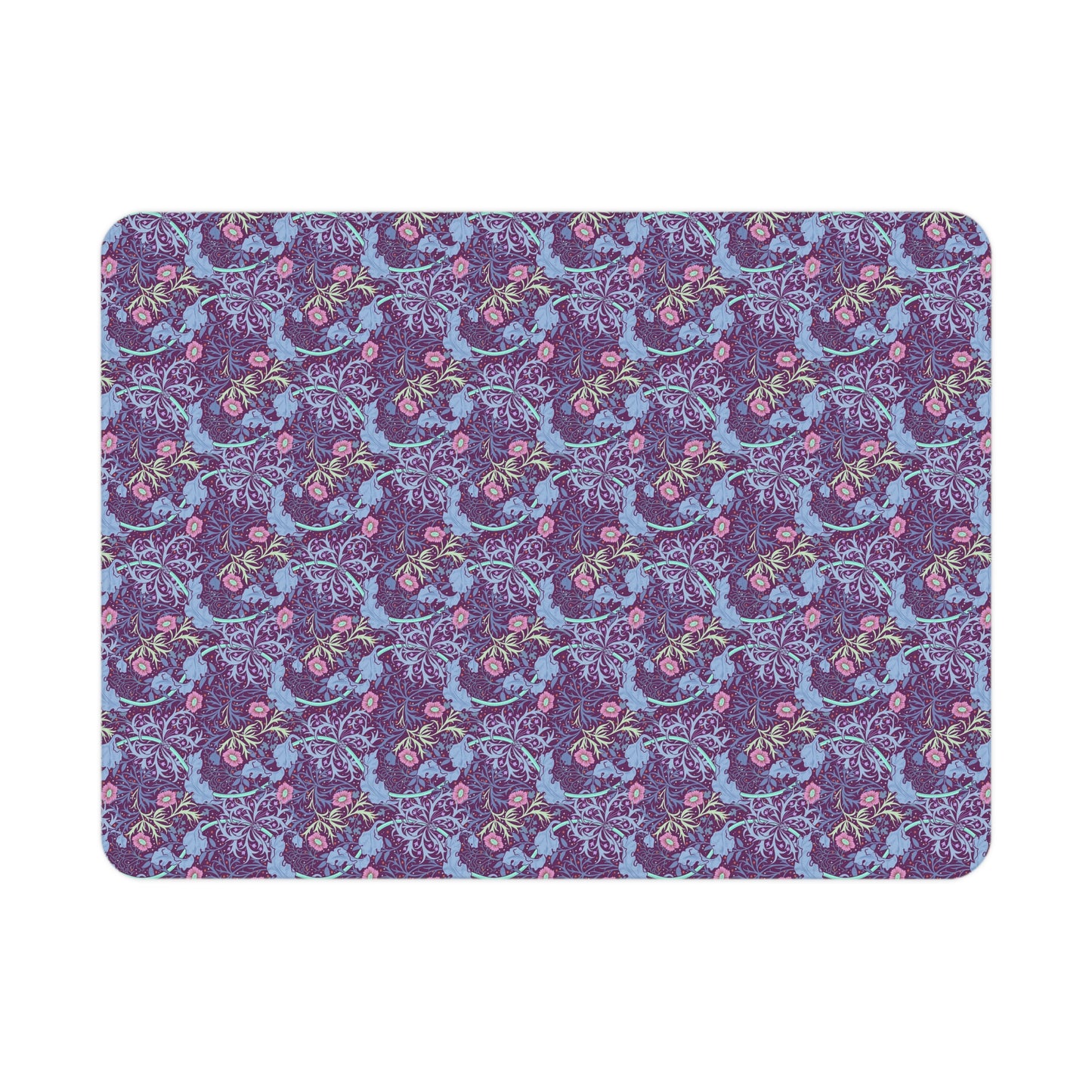 Patterned blanket with blue and pink design on a purple background
