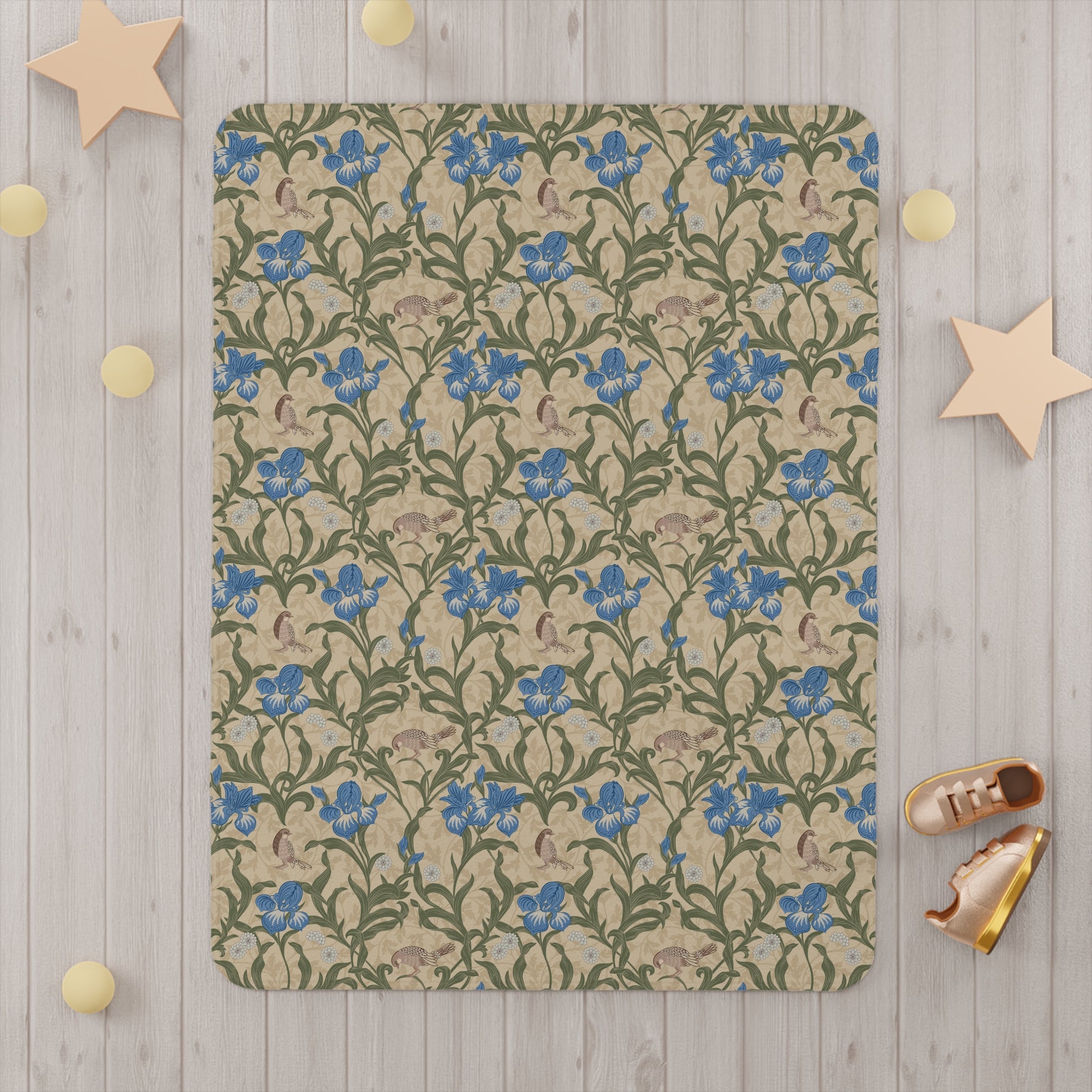 Floral patterned rug on a wooden floor with decorative stars and shoes around it.