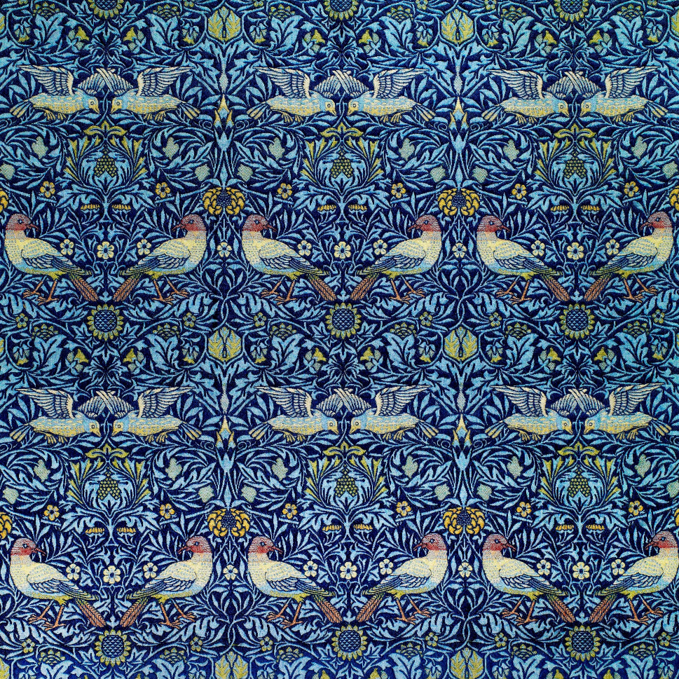 Patterned fabric with birds and floral designs on a blue background