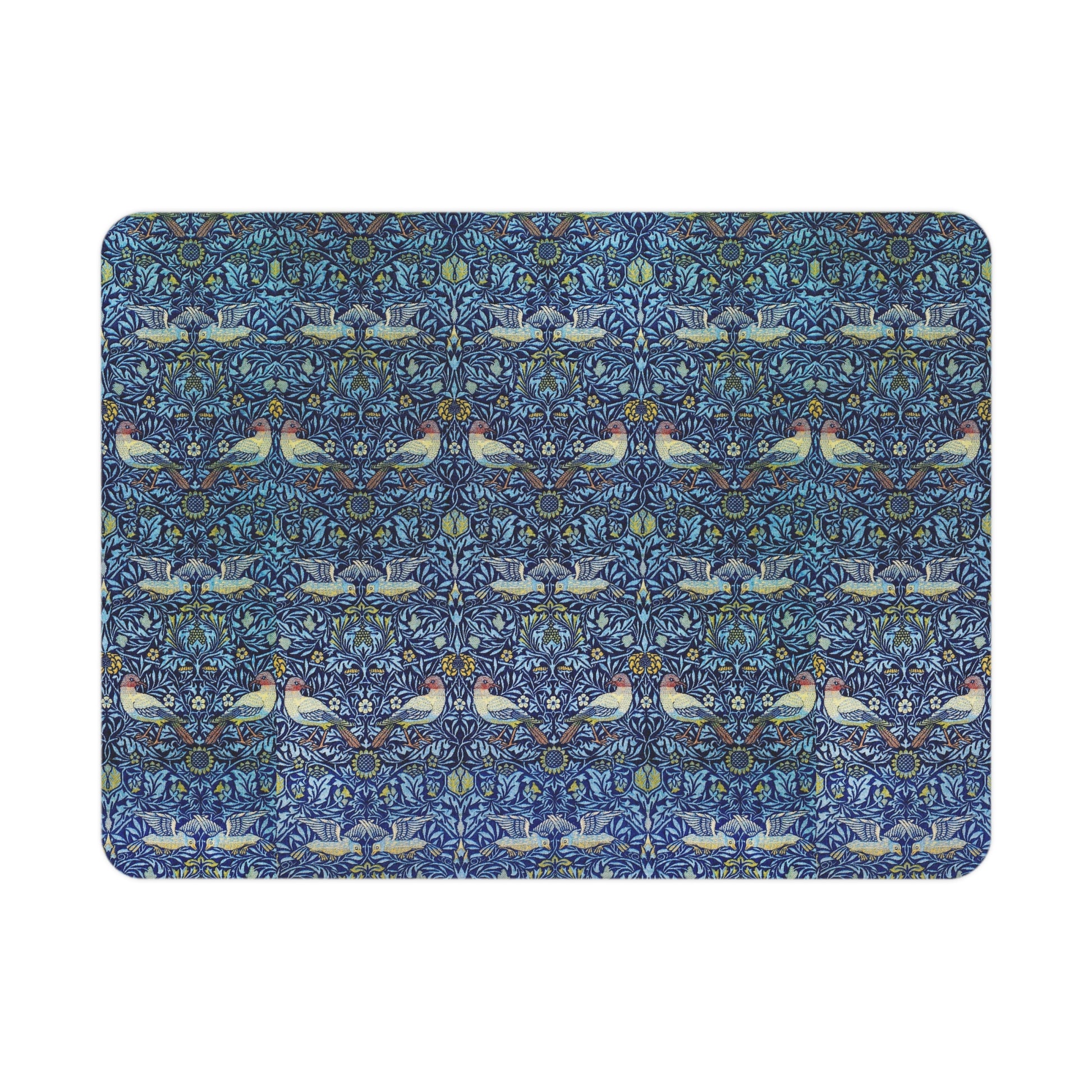 Patterned blue mat with birds and floral designs on a white background