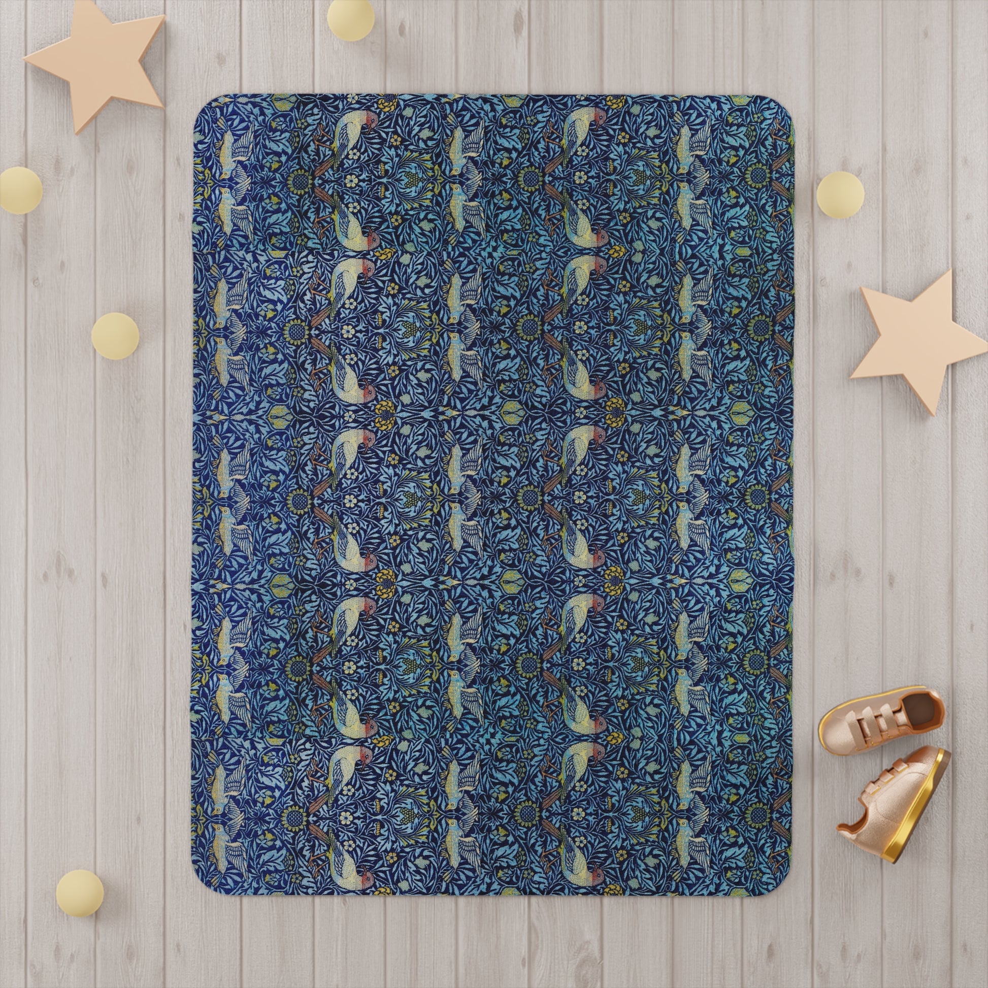 Decorative blanket with a blue pattern on a wooden surface