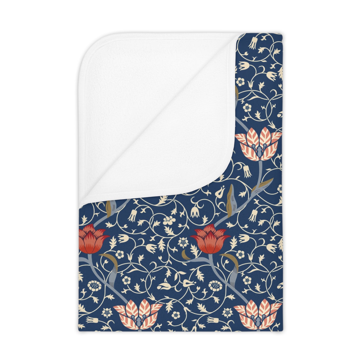 Floral William Morris & Co patterned toddler blanket with red flowers and white leaves on a blue background