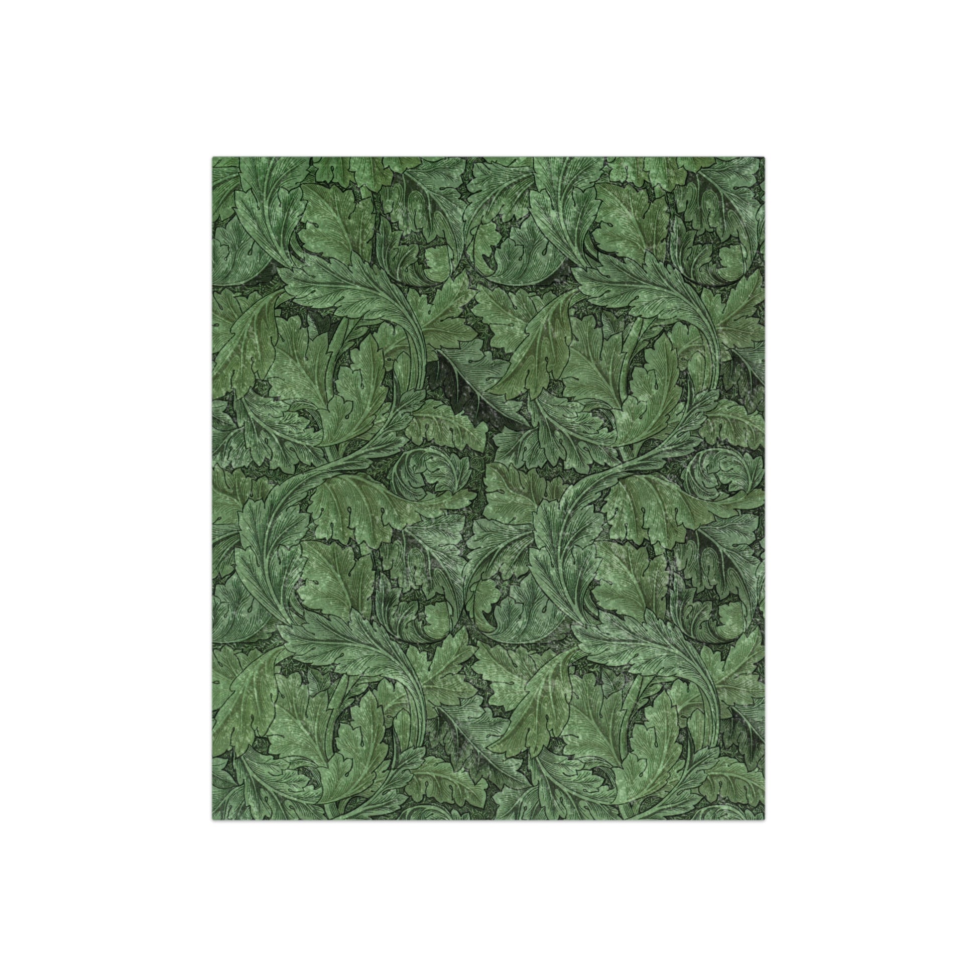 A lush crushed velvet blanket in green with a floral pattern inspired by William Morris, Acanthus Collection.