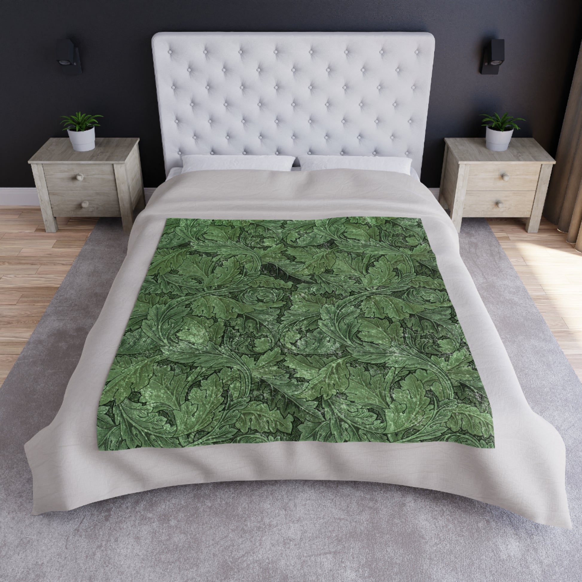 A lush crushed velvet blanket in green with a floral William Morris & Co pattern, featuring hemmed edges and a silky finish.