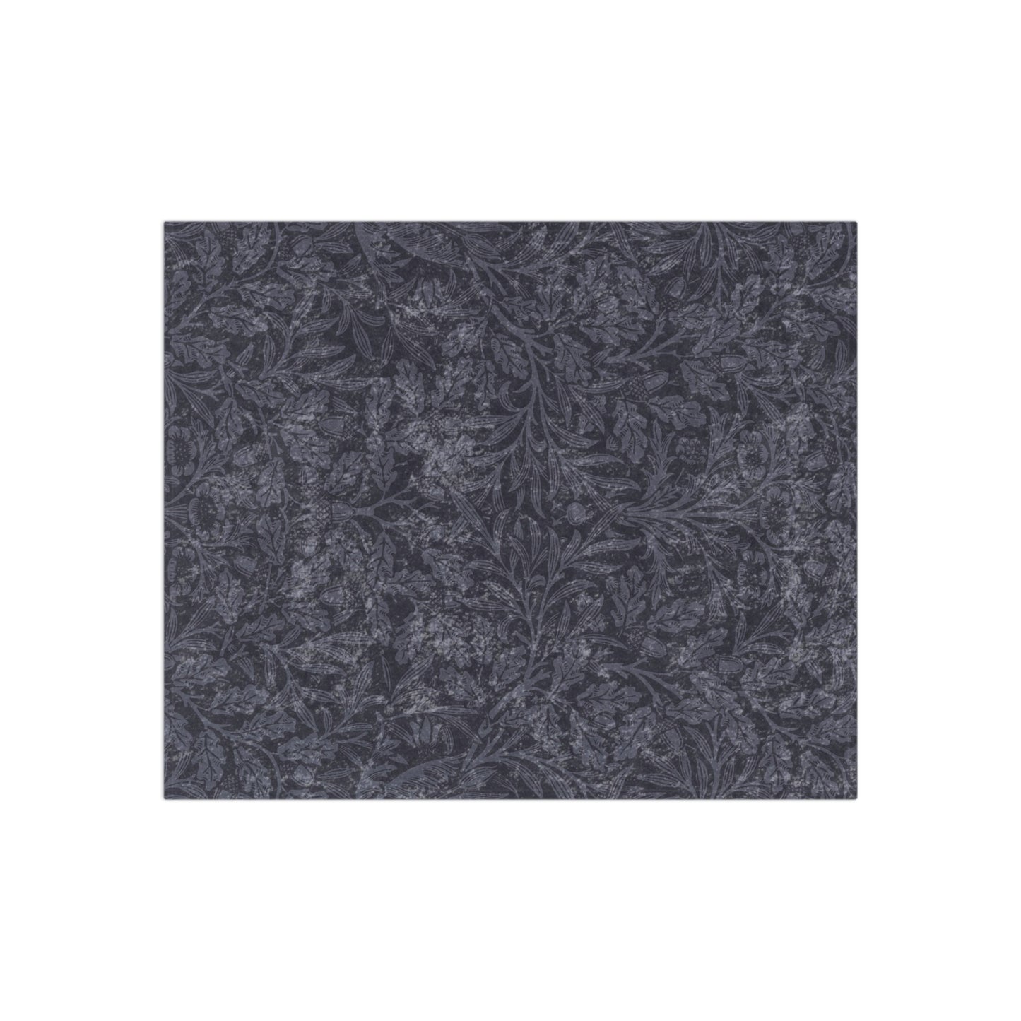 A smoky blue crushed William Morris & Co velvet blanket with a silky finish, laid flat showing both the front and hemmed edges.