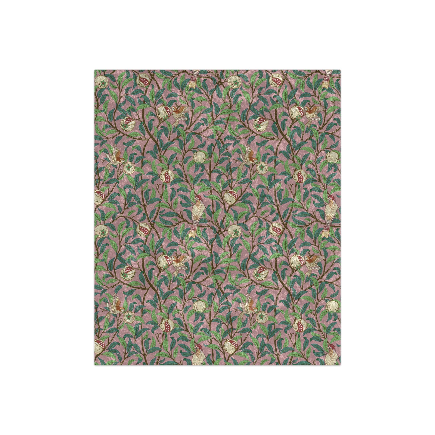 A plush, floral patterned velvet blanket with hemmed edges, inspired by William Morris' Bird & Pomegranate Collection.