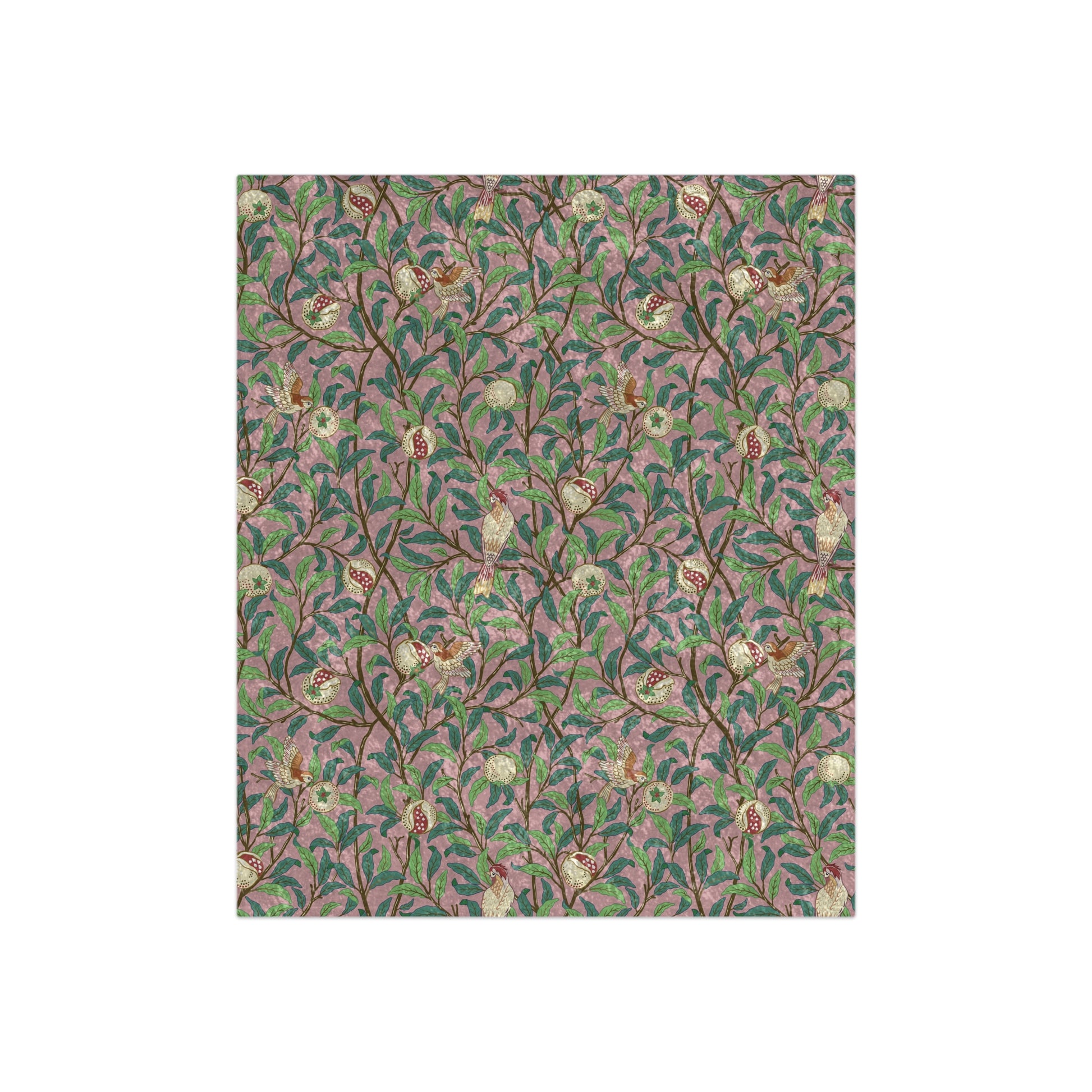 A plush, floral patterned velvet blanket with hemmed edges, inspired by William Morris' Bird & Pomegranate Collection.