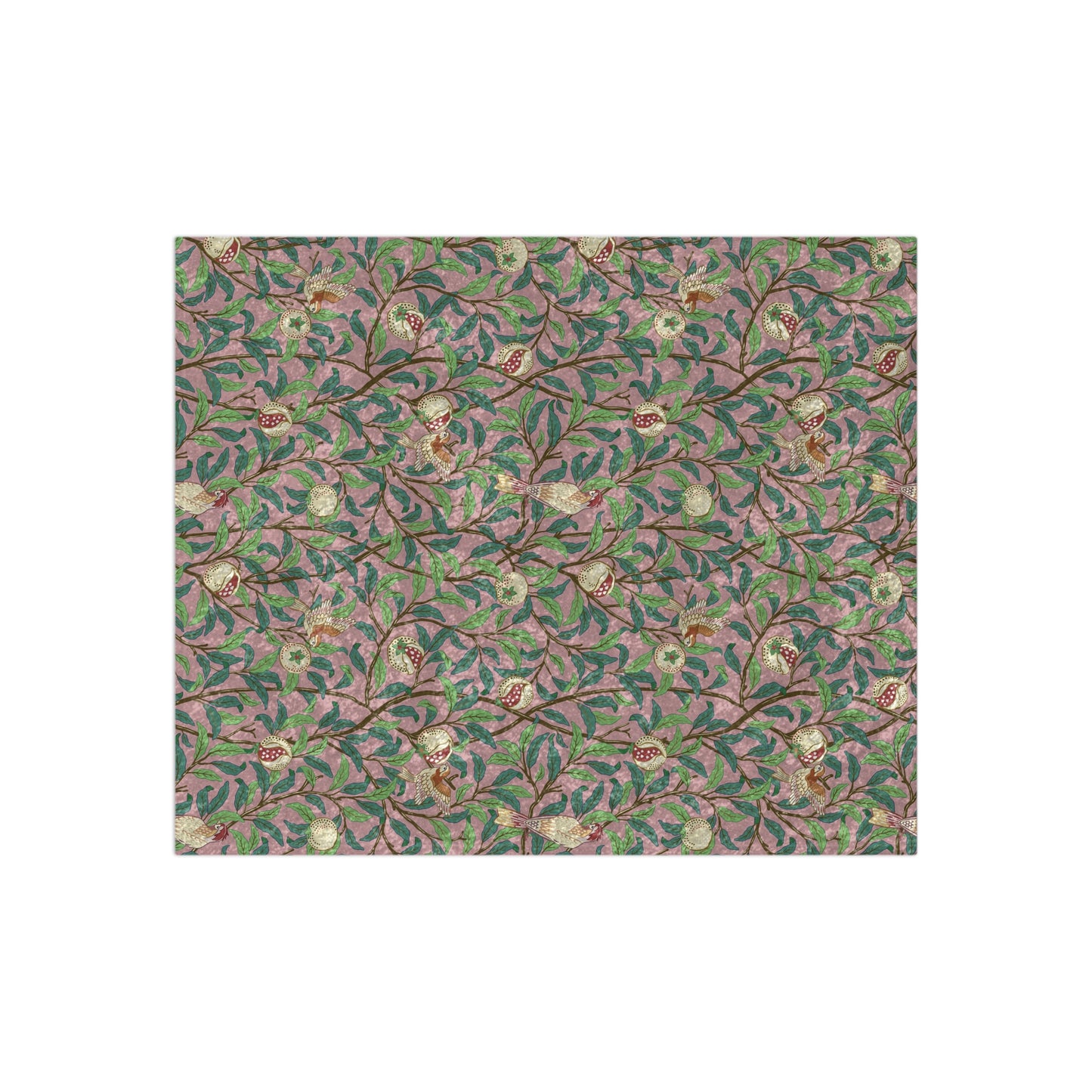 A plush, floral patterned velvet blanket with hemmed edges, inspired by William Morris' Bird & Pomegranate Collection.