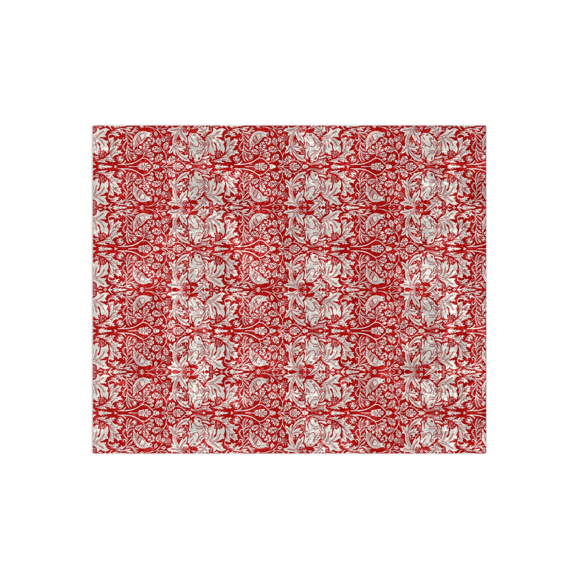 Red and white floral patterned fabric on a white background