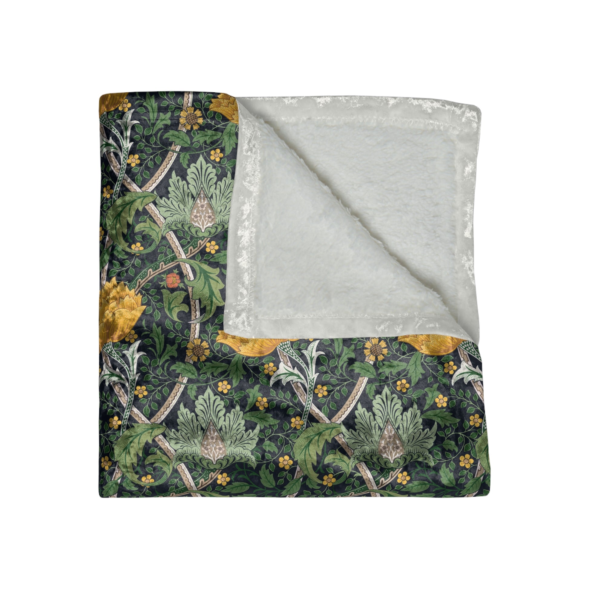 A lush crushed velvet blanket with a William Morris & Co floral pattern in yellow and green shades, displayed on a white background.