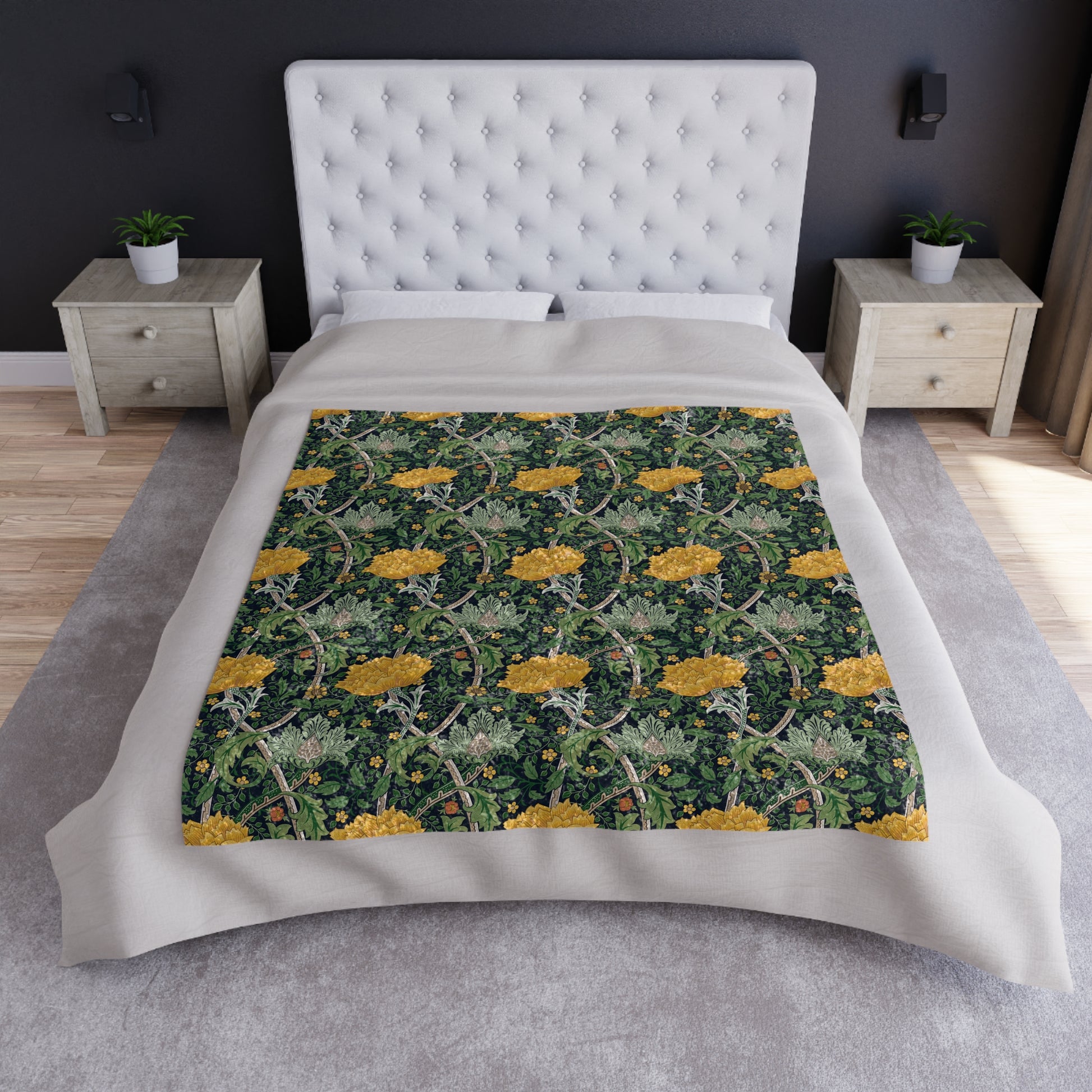 A lush crushed velvet blanket with a William Morris & Co floral pattern in yellow and green shades, displayed on a white background.
