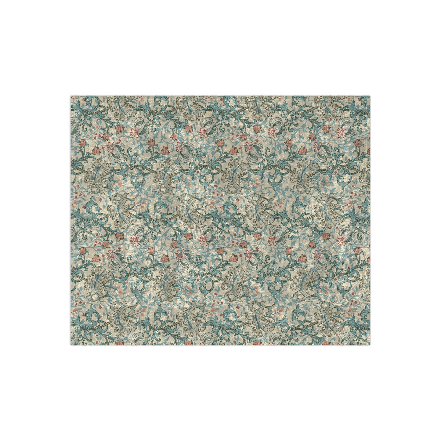 A plush velvet blanket with a floral pattern in a mineral colour palette, folded neatly to show both the patterned side and the silky reverse.