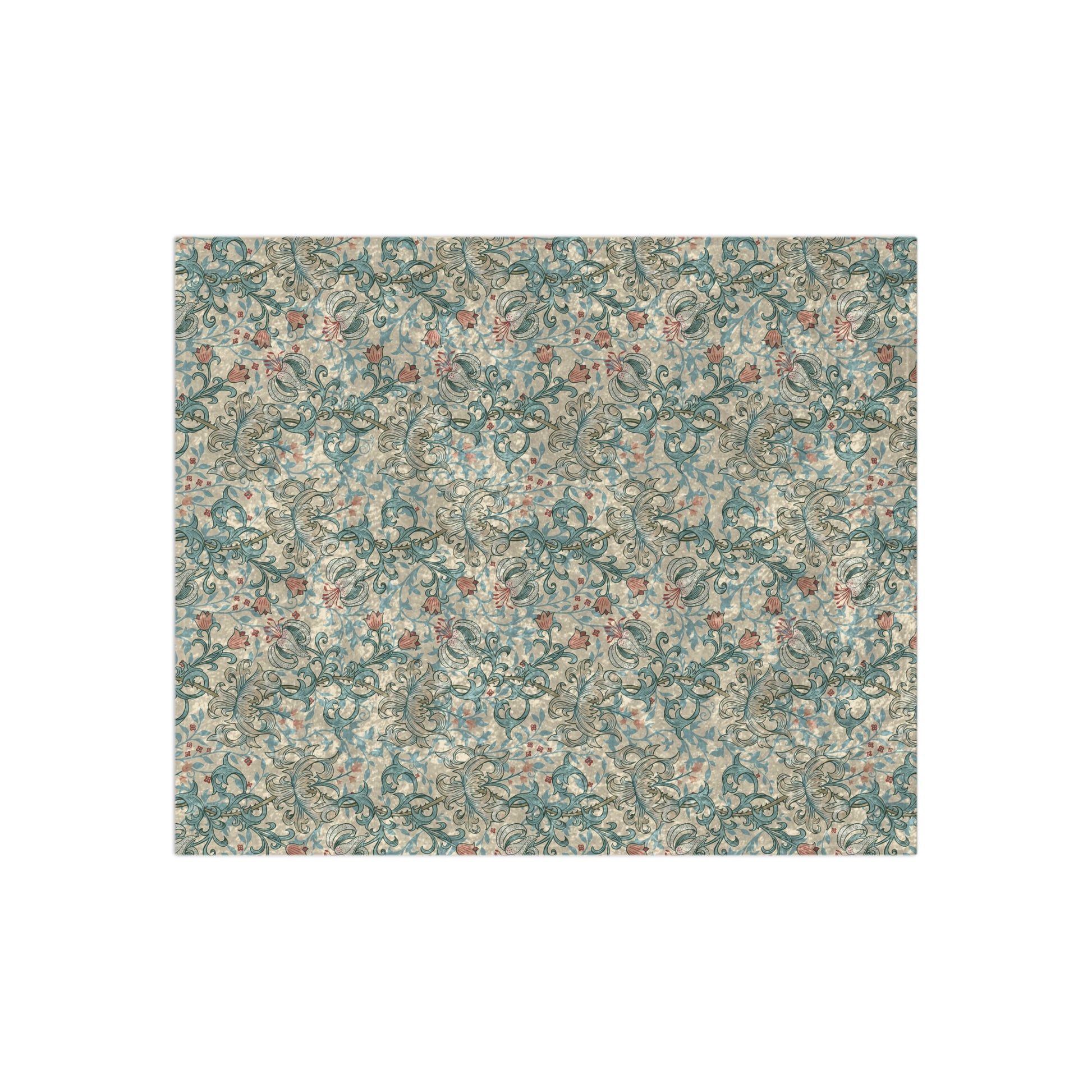 A plush velvet blanket with a floral pattern in a mineral colour palette, folded neatly to show both the patterned side and the silky reverse.