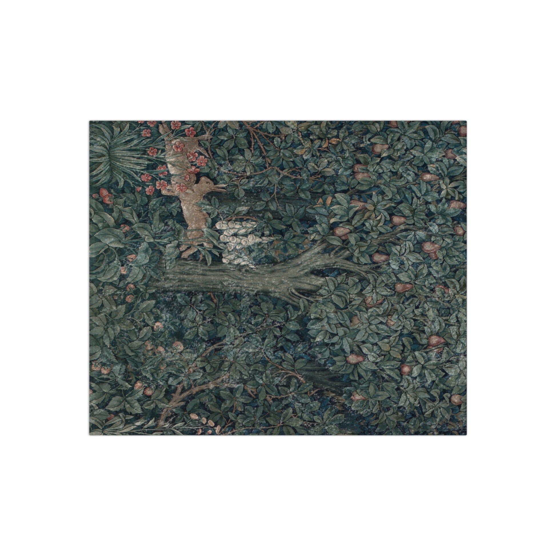 A lush crushed velvet blanket with a William Morris & Co greenery and rabbit pattern on one side and a solid silver reverse.