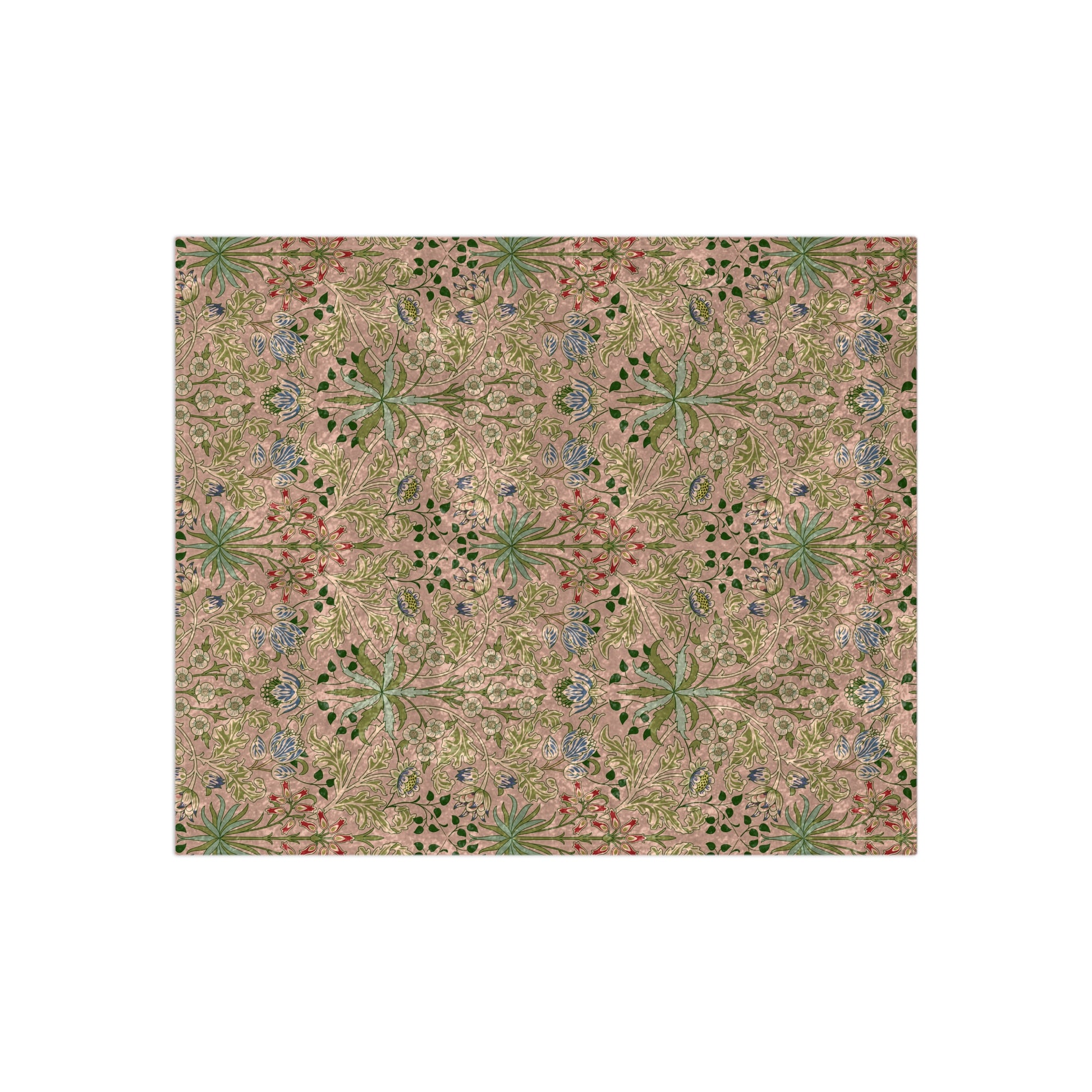 A plush velvet blanket with a floral William Morris & Co pattern in shades of pink and green, with a silky finish.