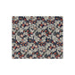 A lush crushed velvet blanket with a floral William Morris & Co pattern in shades of blue, red, and white, hemmed edges, and a silky finish.