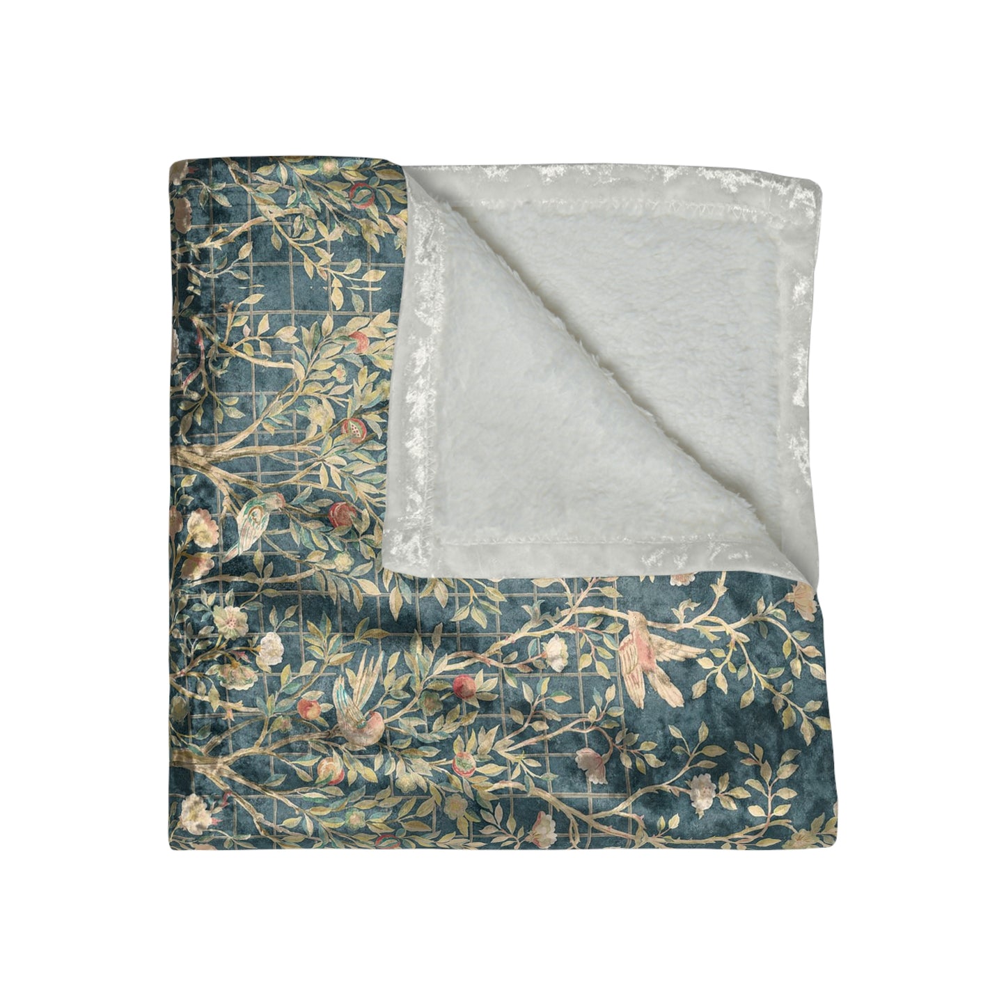 A lush crushed velvet blanket with a floral William Morris & Co pattern in evergreen teal colours, hemmed edges and a silky finish.