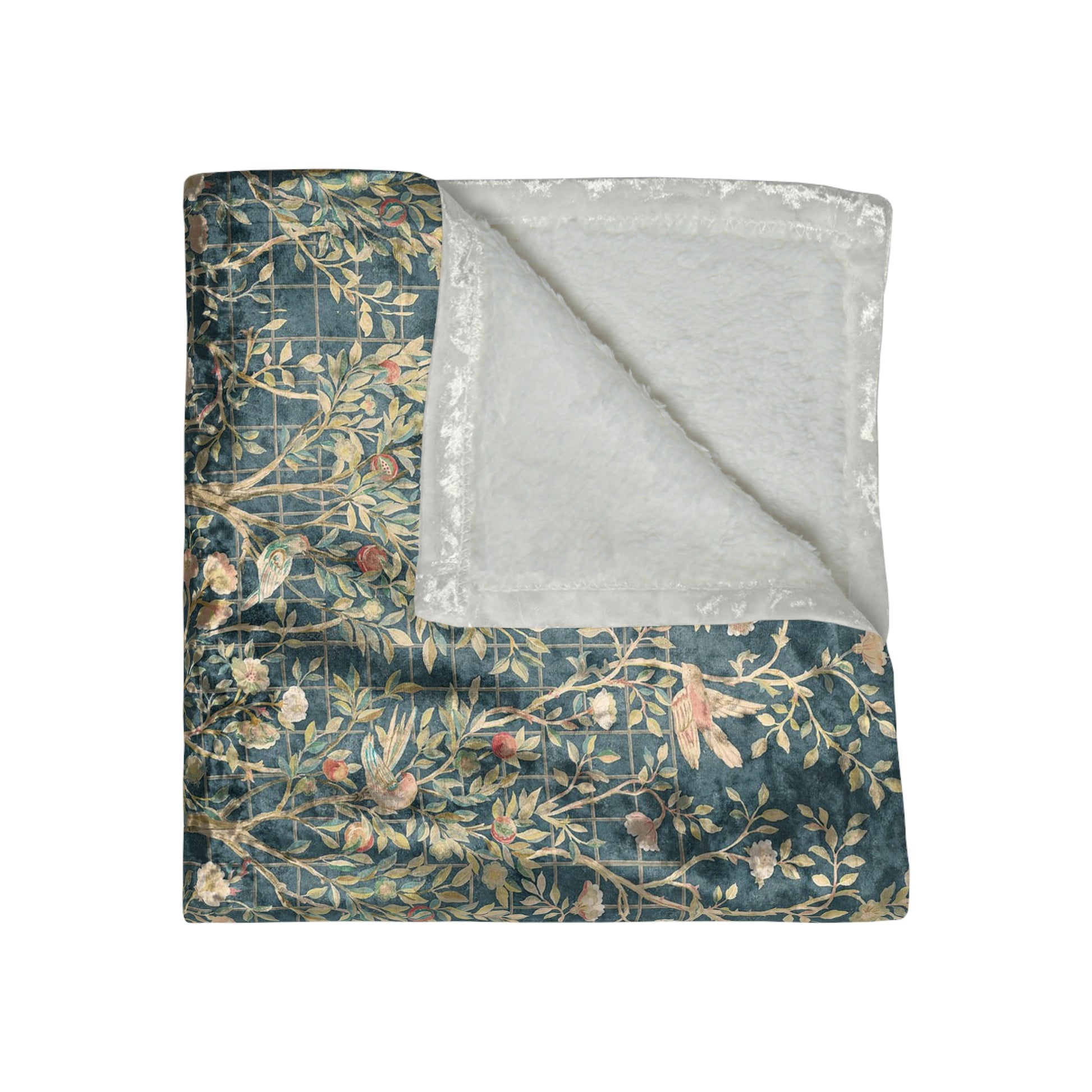 A lush crushed velvet blanket with a floral William Morris & Co pattern in evergreen teal colours, hemmed edges and a silky finish.