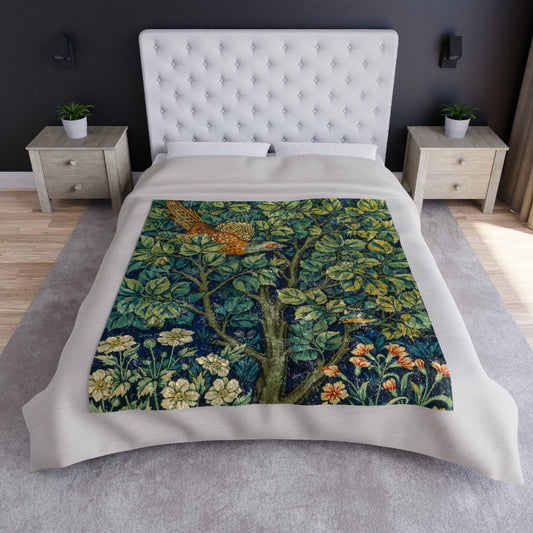 A lush crushed velvet blanket with a floral William Morris & Co pattern in shades of green and yellow, hemmed edges, and a silky finish.