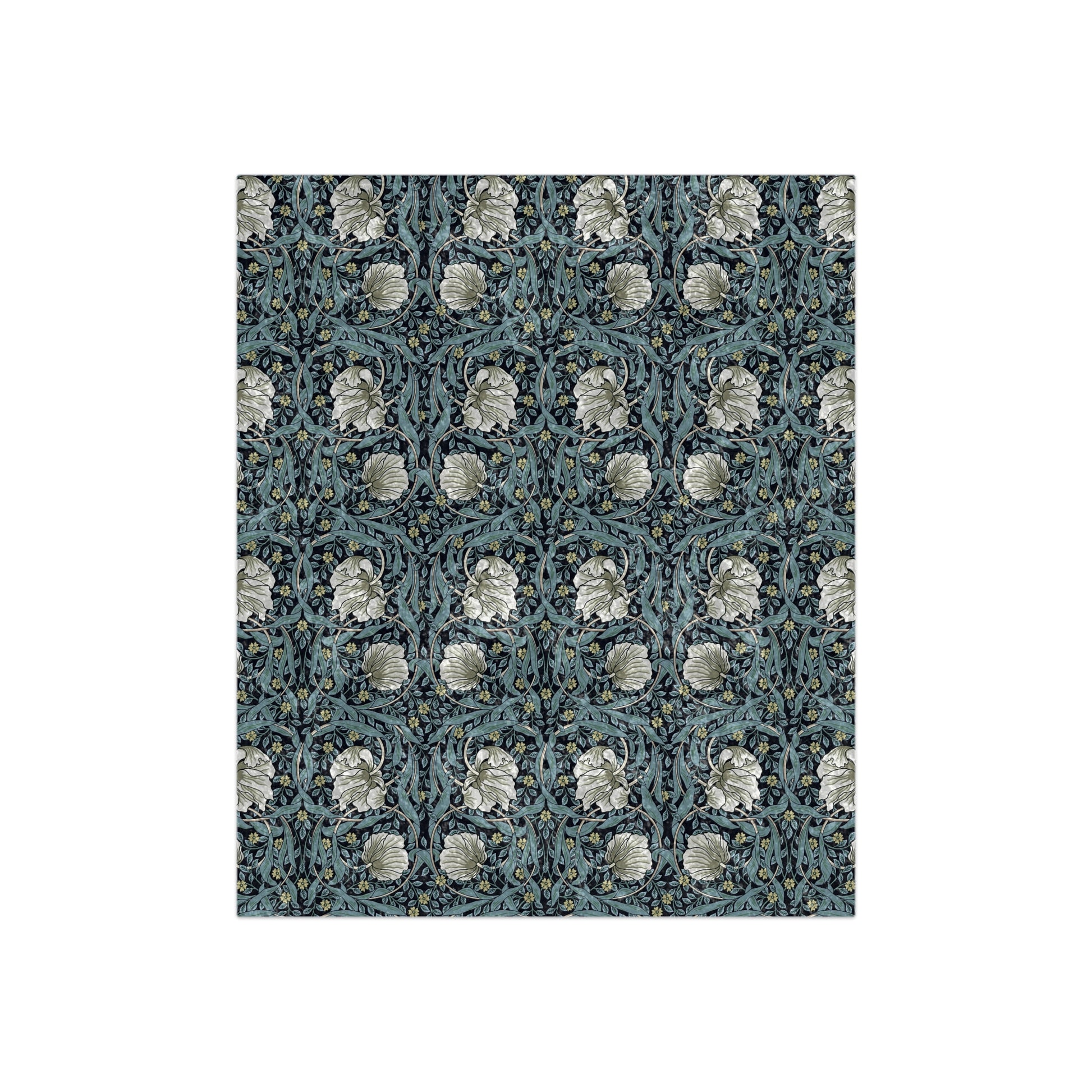A blanket with a crushed velvet texture featuring a geometric pattern in a slate blue color.