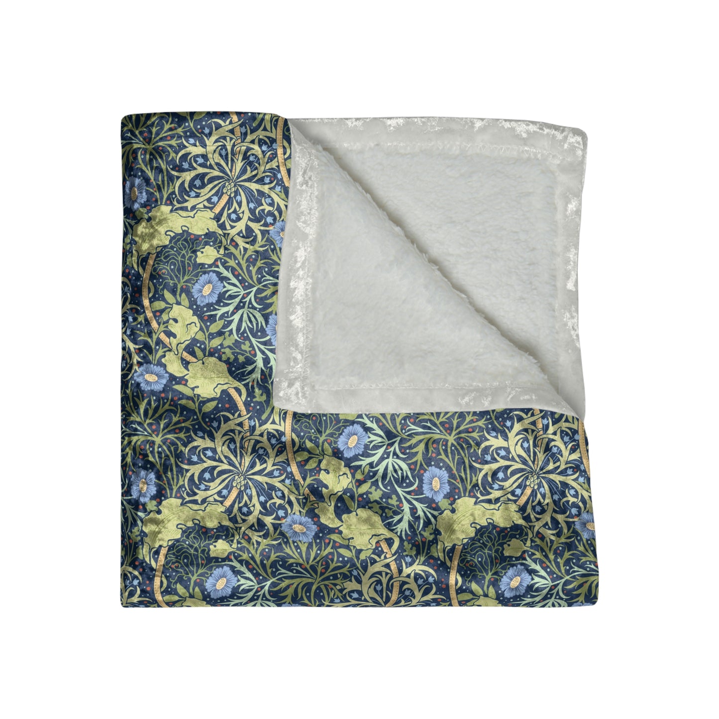 A plush blue floral patterned velvet blanket with hemmed edges and a silky finish.