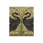 A luxurious blanket with a design of two black swans on a green and gold background, inspired by William Morris.