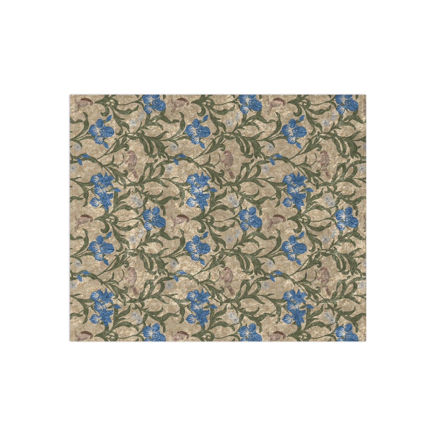 A plush velvet blanket with a floral William Morris & Co pattern in blue and yellow colours on a beige background, displayed on a flat surface.