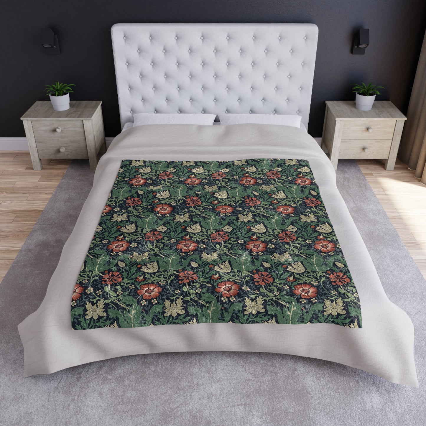 A lush crushed velvet blanket with a William Morris & Co floral pattern in green, red, and brown colours, displayed on a white background.