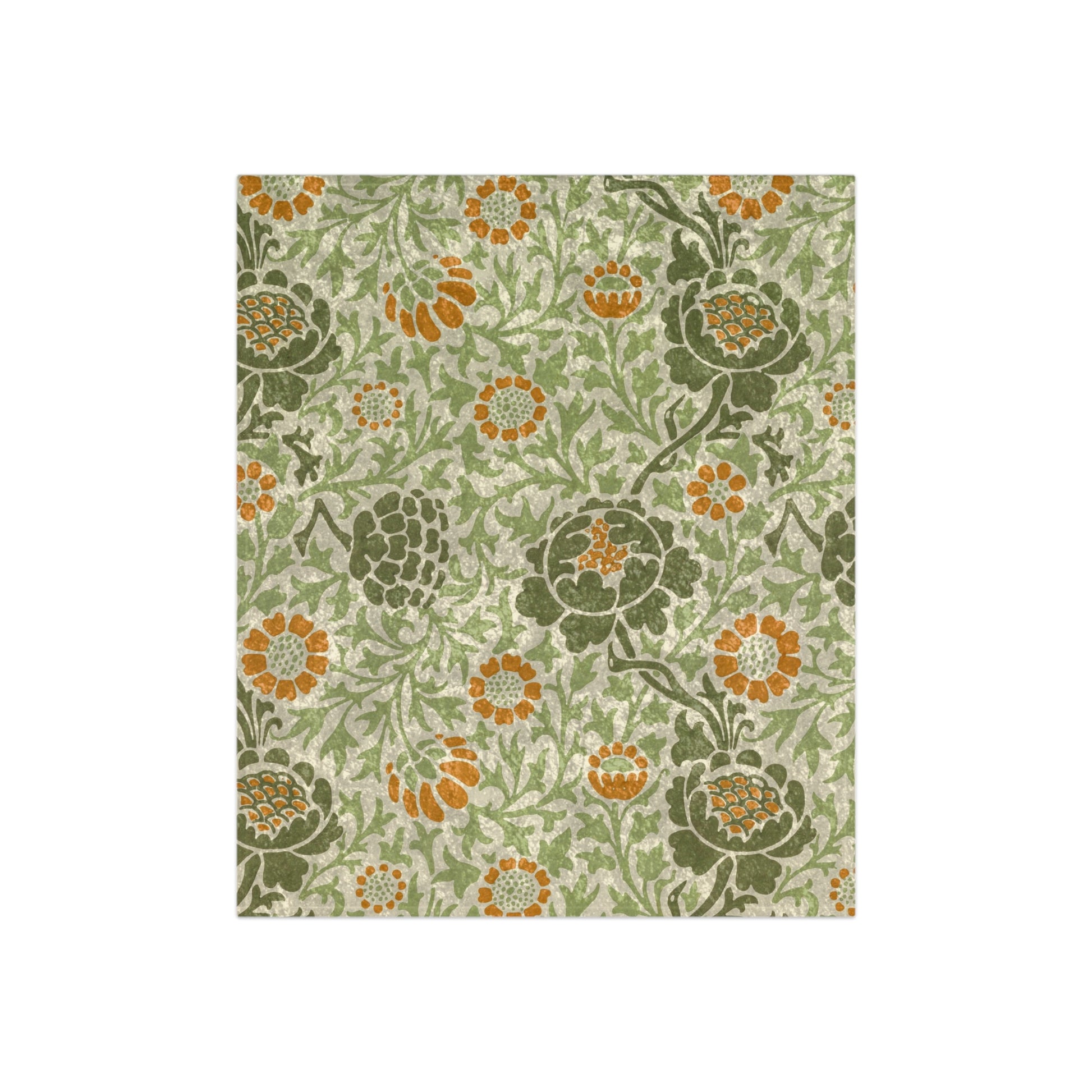 A lush crushed velvet blanket with a floral pattern in green and orange colors from the Grafton Collection inspired by William Morris.