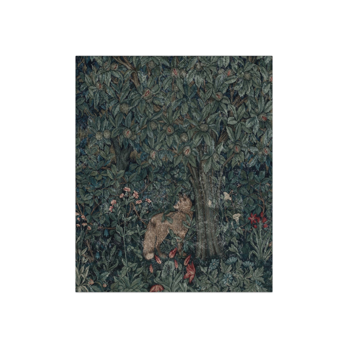 A woven velvet blanket featuring a floral pattern with a central tree and surrounding foliage, inspired by William Morris' artwork.