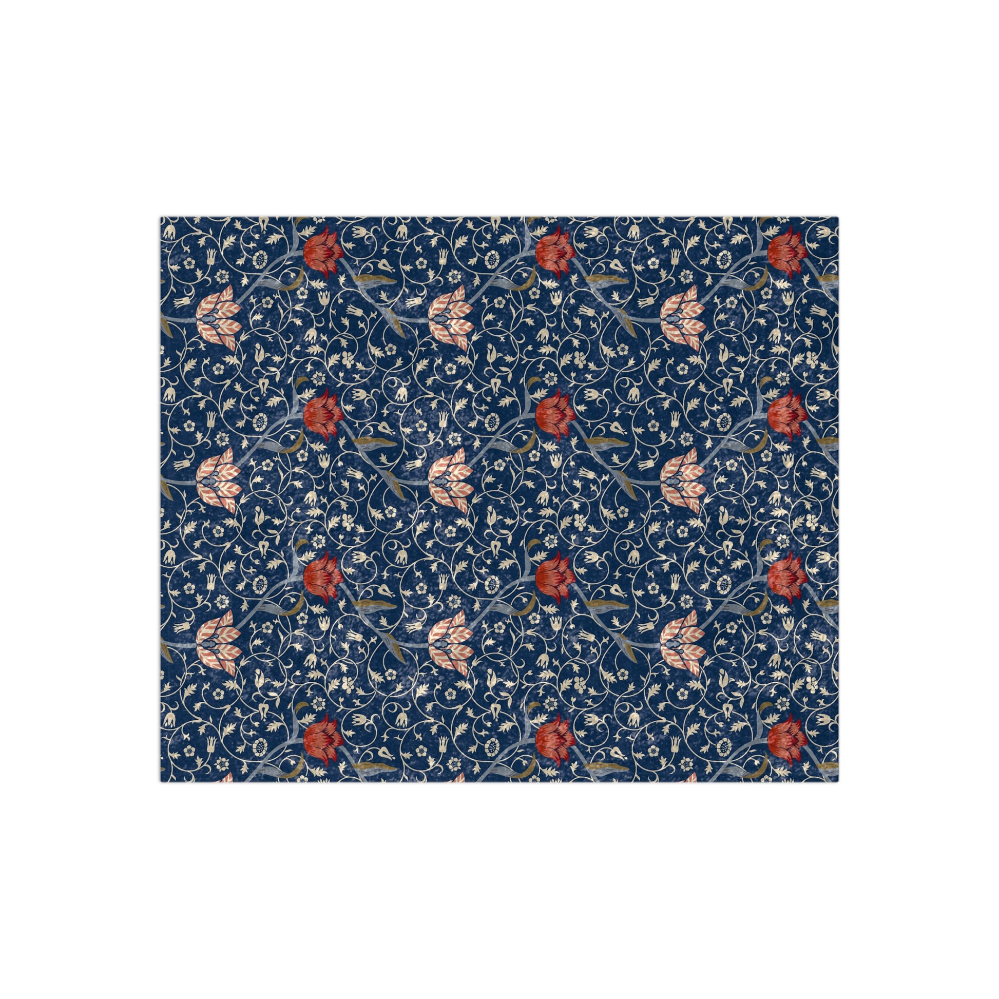 A lush crushed velvet blanket with a William Morris & Co floral pattern in blue and red colours, inspired by William Morris, with a silky finish.