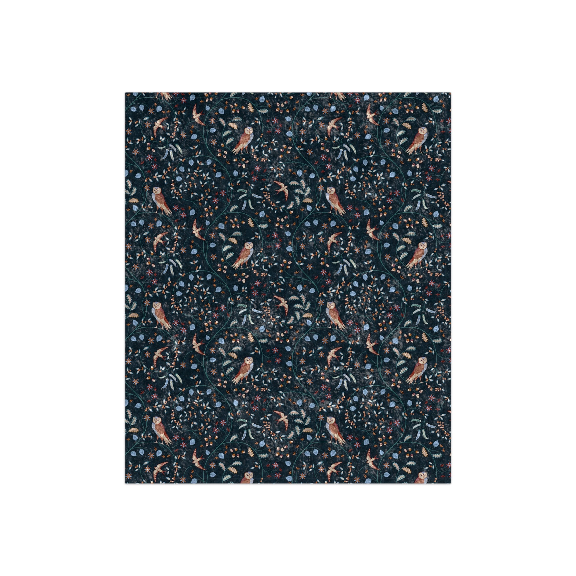 Patterned fabric swatch with birds and foliage on a dark background