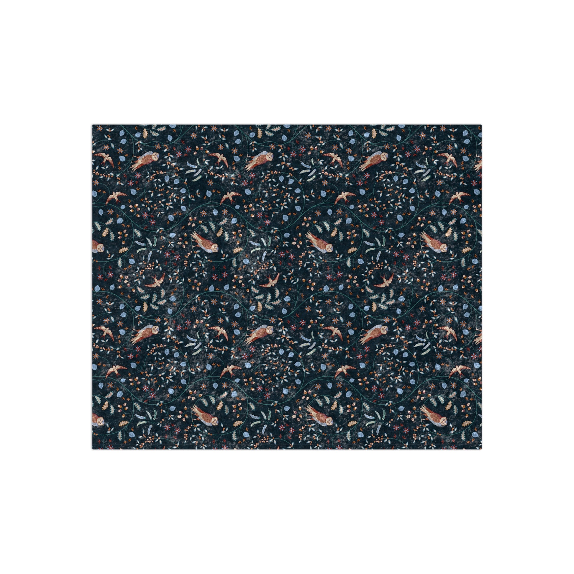Patterned fabric swatch with small animal illustrations on a dark background