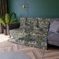 Floral-patterned sofa cover on a gray sofa against a green wall with decorative elements.