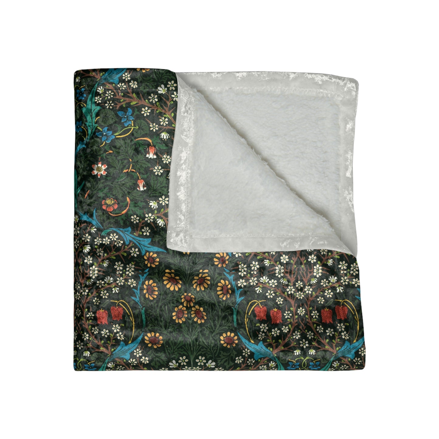 A lush crushed velvet blanket with a floral pattern in red and green colors, displayed on a flat surface.