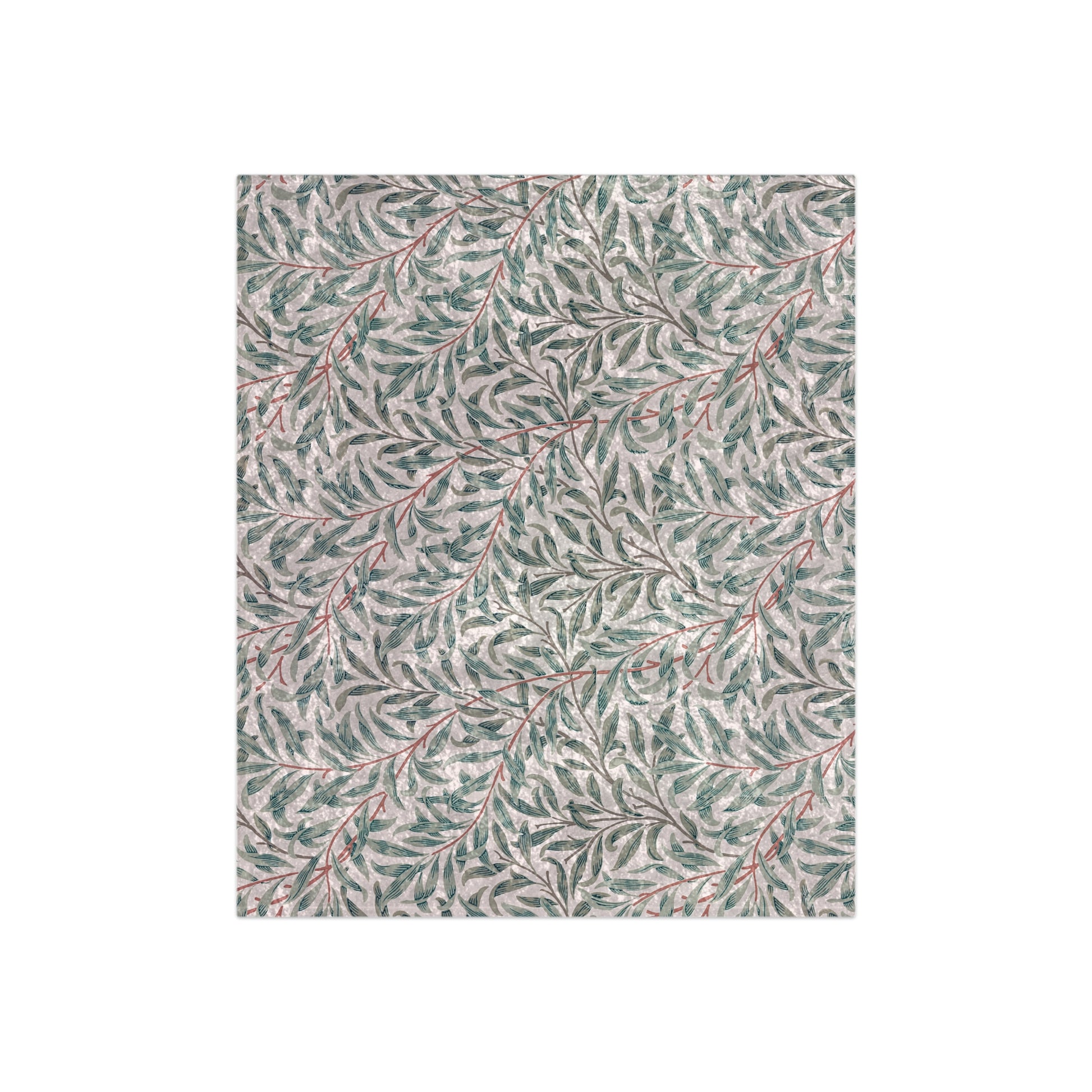 A crushed velvet blanket with a floral pattern in green and red on a white background, hemmed edges, and a silky finish.