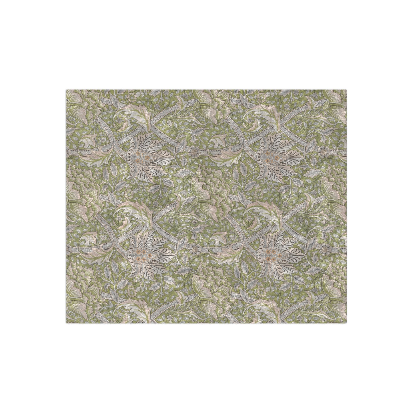 A plush, velvet blanket with a floral William Morris & Co pattern in shades of green and beige, laid out with the soft side up.