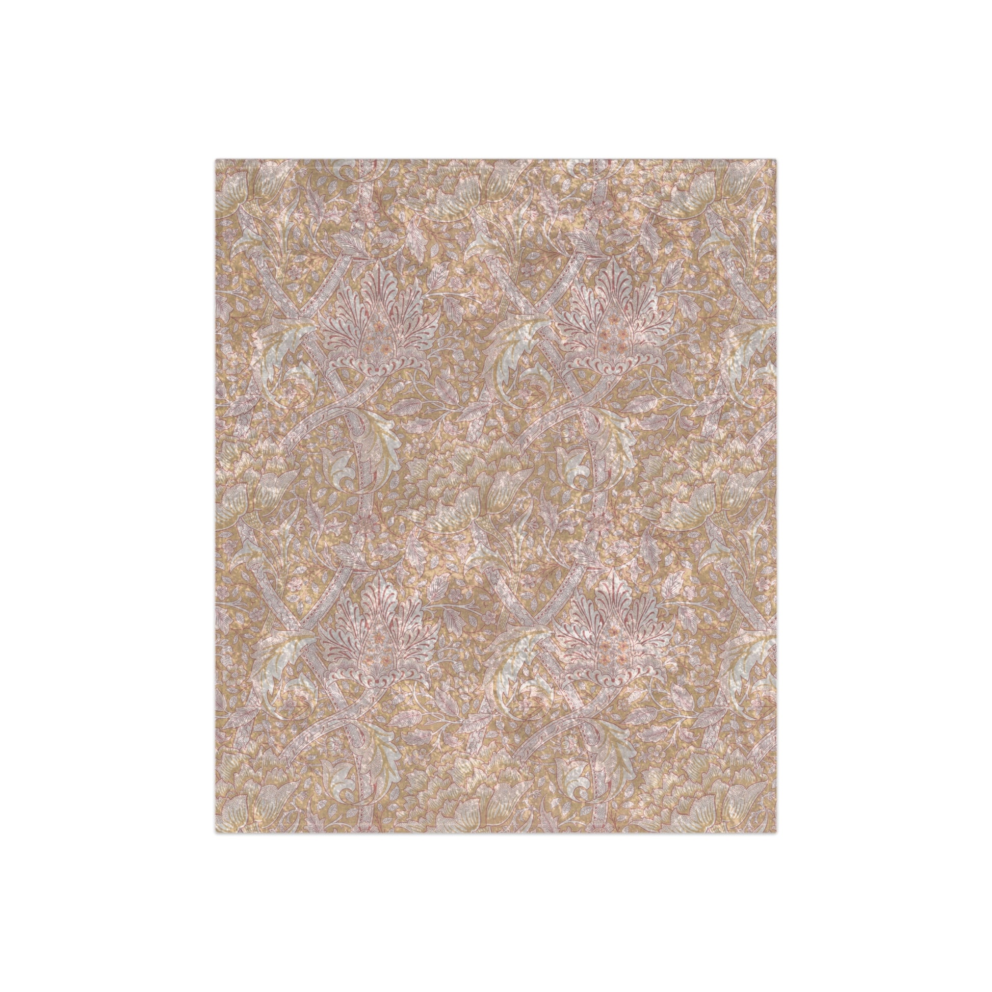 A plush, velvet blanket with a floral pattern in muted colors, folded to show both the front and back.