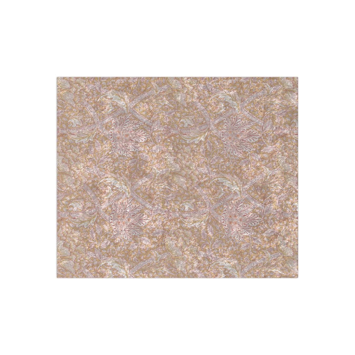 A plush, velvet blanket with a floral William Morris & Co pattern in muted colours, folded to show both the front and back.