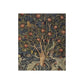 A decorative velvet blanket featuring a tree with fruit and a woodpecker, inspired by William Morris' artwork.