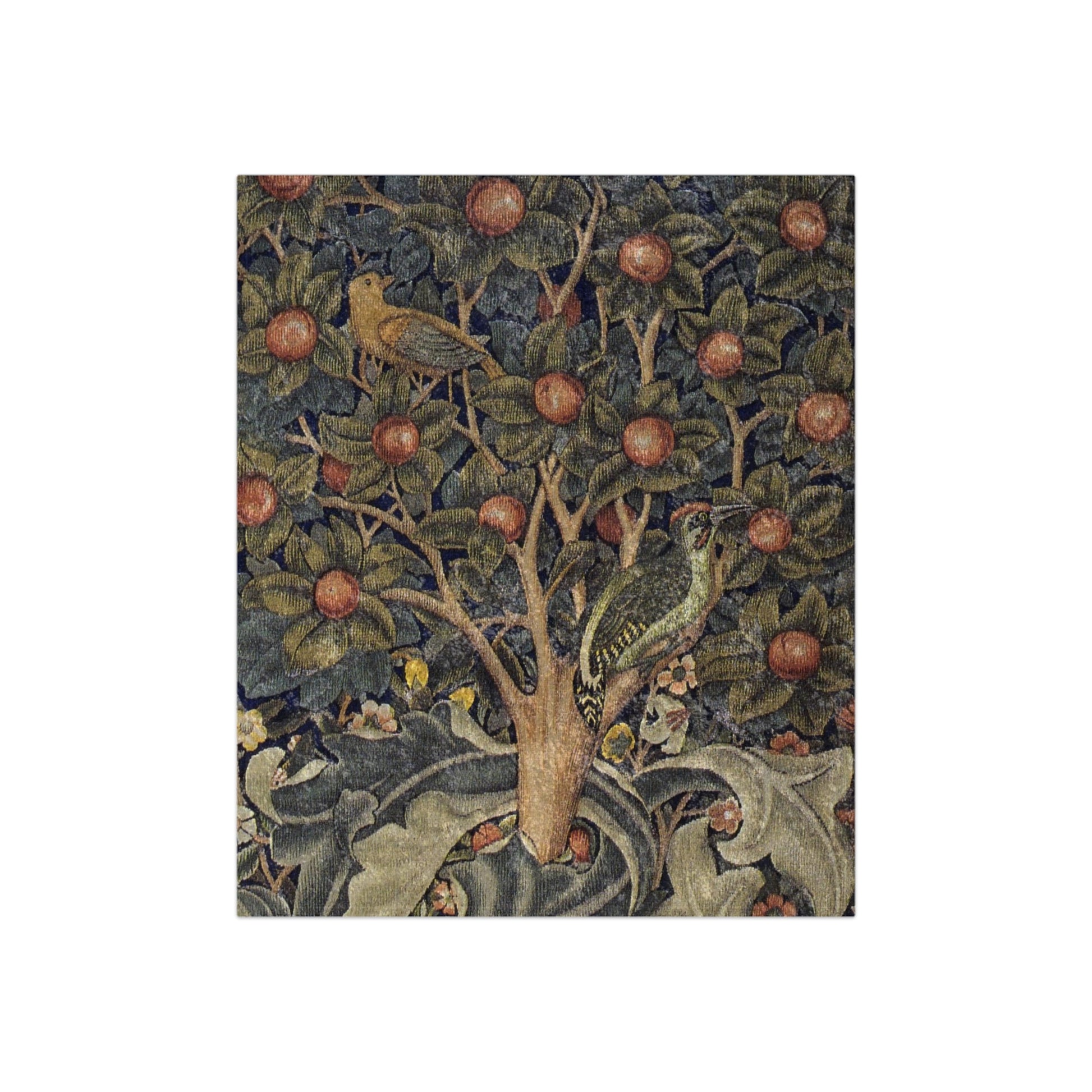 A decorative velvet blanket featuring a tree with fruit and a woodpecker, inspired by William Morris' artwork.