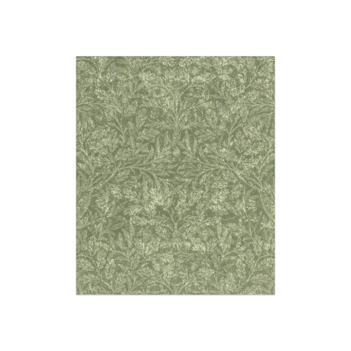 A green crushed velvet blanket with a floral pattern, folded neatly, with the silky reverse side partially visible.