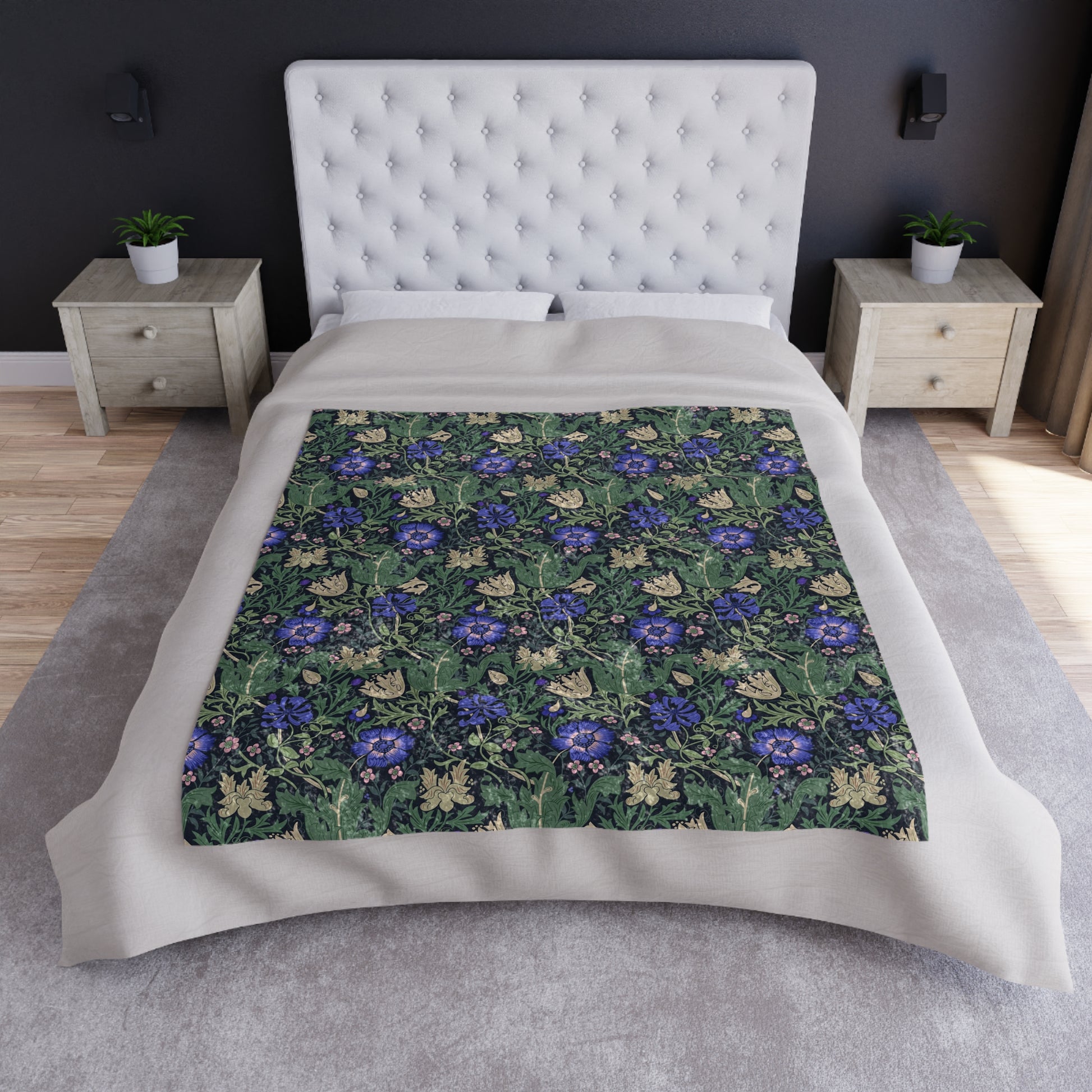 A lush crushed velvet blanket with a floral pattern inspired by William Morris, featuring a bluebell cottage design, displayed folded with the reverse side showing.