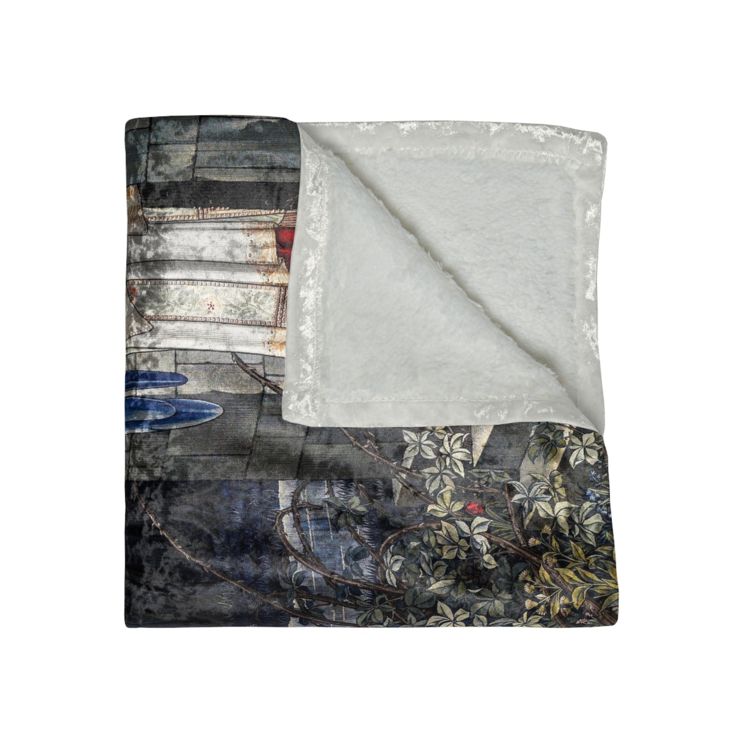 A crushed velvet blanket with a floral William Morris & Co pattern on a dark background, folded to show both sides.