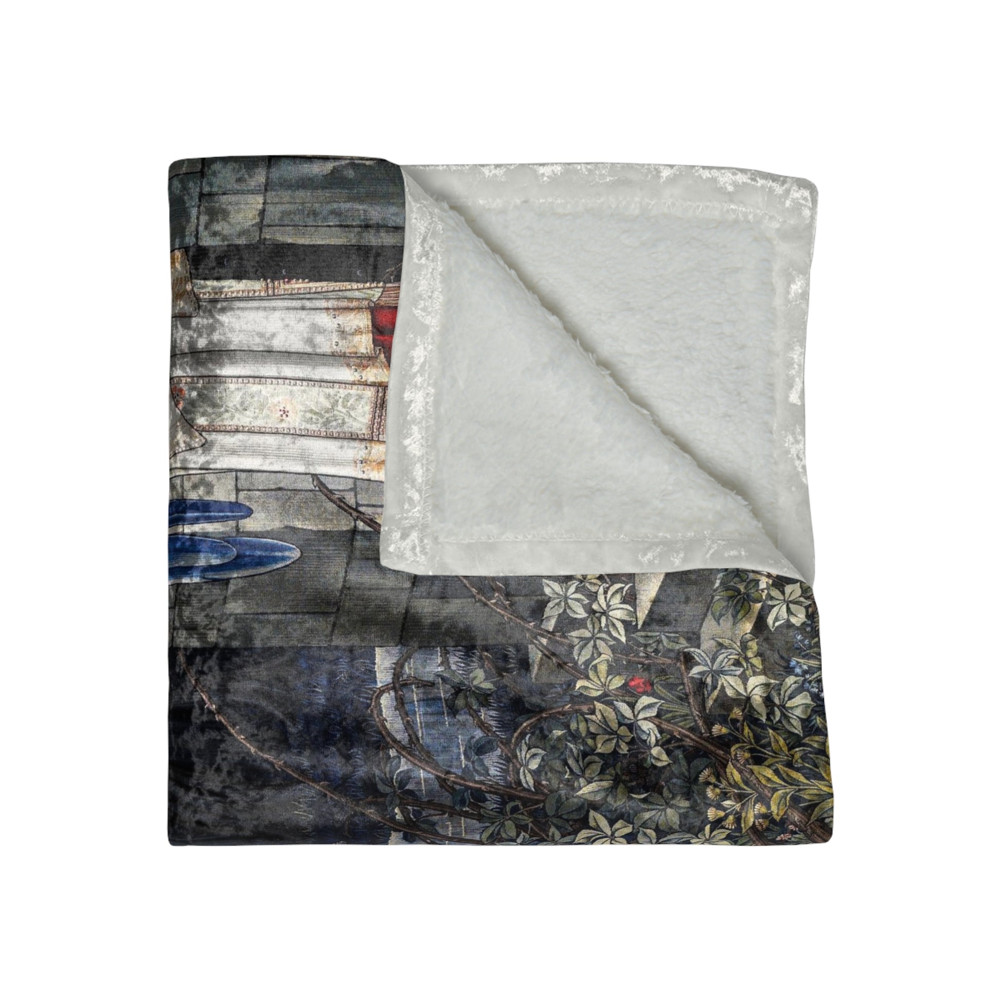 A crushed velvet blanket with a floral William Morris & Co pattern on a dark background, folded to show both sides.